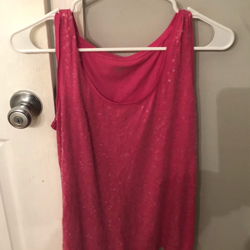 Pink sequins on front .. plain back. Never worn